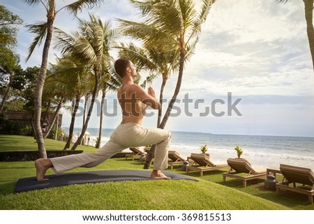 Similar – Image, Stock Photo Shirtless man doing yoga on terrace