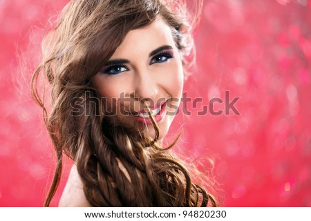 young model with long great hear over red background