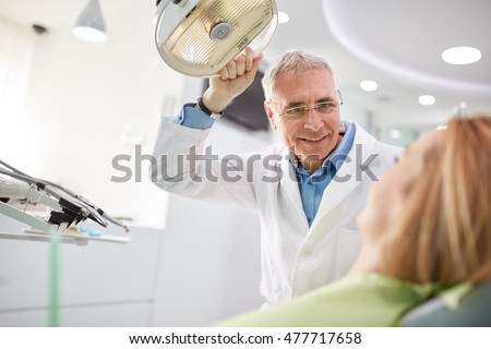 Similar – Image, Stock Photo Dentist working with denture in laboratory