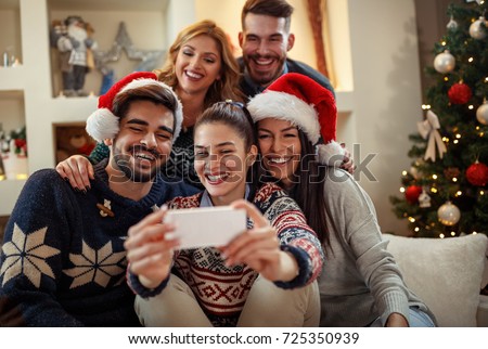 Similar – Image, Stock Photo Young couple enjoying Christmas Lights