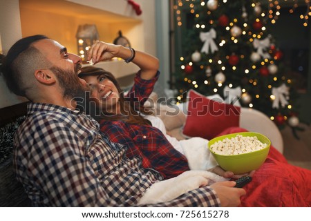 Similar – Image, Stock Photo Young couple enjoying Christmas Lights