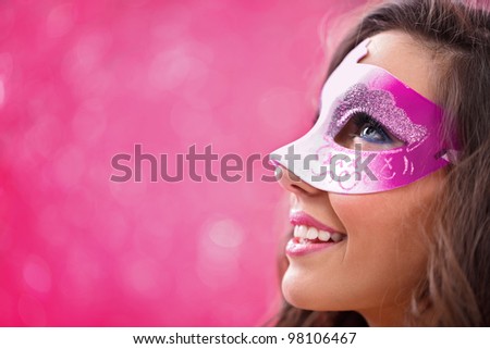 mysterious woman masquerading over red background