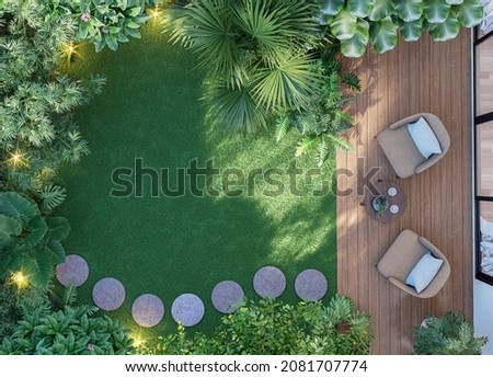 Top view wooden terrace with tropical style green garden 3d render