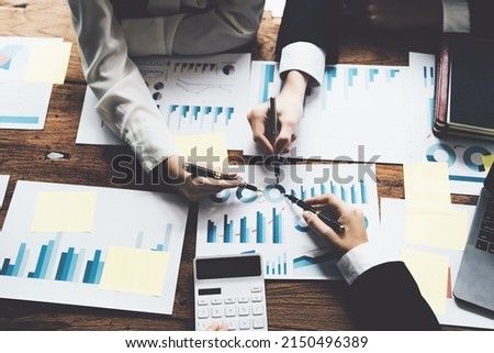 financial, Brainstorming, Consulting, Data Analysis, Planning, Marketing and Accounting, Economists pen pointing to investment documents with partners on profit taking to compete with other companies Foto stock © 