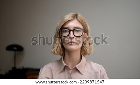 Similar – Image, Stock Photo Close-up portrait of serious black man looking down.