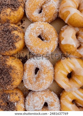 Similar – Foto Bild Vielfalt von Donuts auf rosa Hintergrund