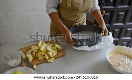 Similar – Image, Stock Photo Baking apple pie, recipe step by step. Making of an apple tart isolated on green background