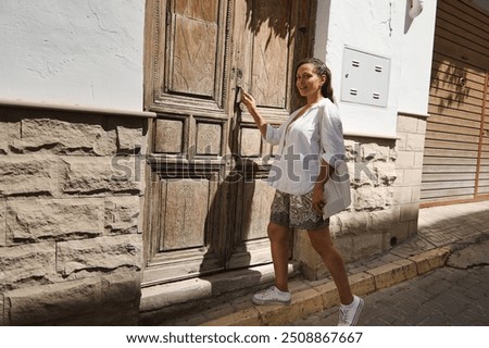 Similar – Image, Stock Photo Rustic dressed woman with grey wool jacket and blue scarf with fringes in autumn in front of a farm in Rudersau near Rottenbuch in the district Weilheim-Schongau in Upper Bavaria