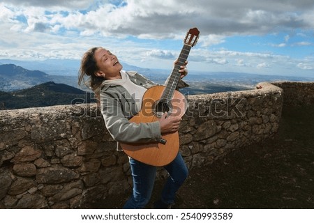 Similar – Foto Bild Zufriedene Frau spielt zu Hause Gitarre