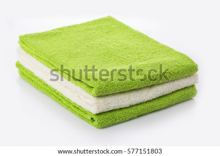 three towels. Two green and one white towels. White background / three towels. Two green and one white towels. White background / Nadale Zdjęcia stock © 
