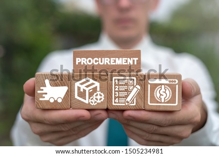 Man arranging wooden blocks with supply chain and retail logistics icons. Procurement Management Industry concept. Stockfoto © 