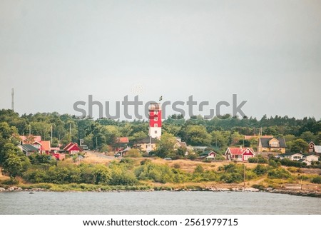 Similar – Image, Stock Photo Small coastal village with cottages in bay near snowy mountains