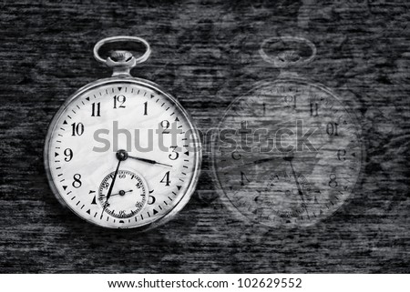 time pass vintage conceptual image; textured old clock