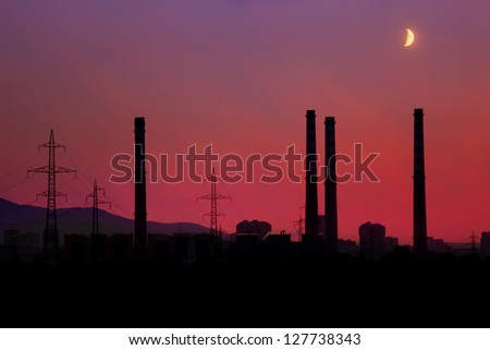 red silhouette industrial background with moon
