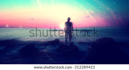 Follow your dreams, silhouette of man and many stars, rising sun on the beach, alien landscape- elements of this image are furnished by NASA