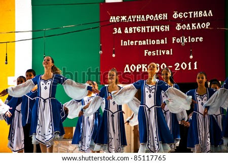 DORKOVO, BULGARIA- JULY 30: Polish folk group presents dance from their national culture at \