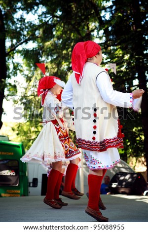 DORKOVO, BULGARIA- JULY 30:Bulgarian Folk Group presents dance from their national culture at \