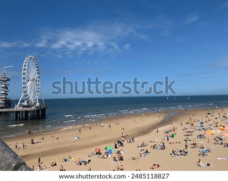 Similar – Image, Stock Photo Scheveningen beach in the evening with a view of the lighthouse and Ferris wheel