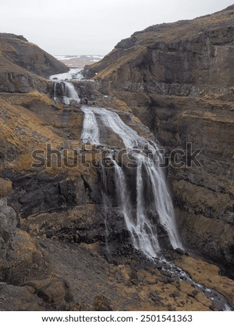 Similar – Image, Stock Photo Majestic waterfall in dark forest