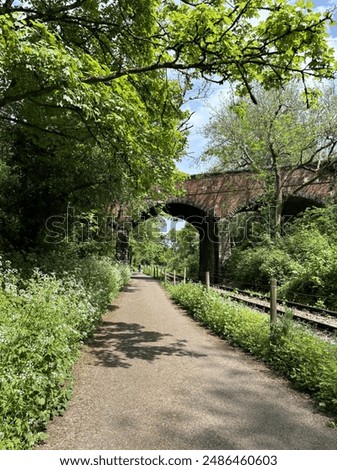 Similar – Foto Bild Unter einer Eisenbahnbrücke.