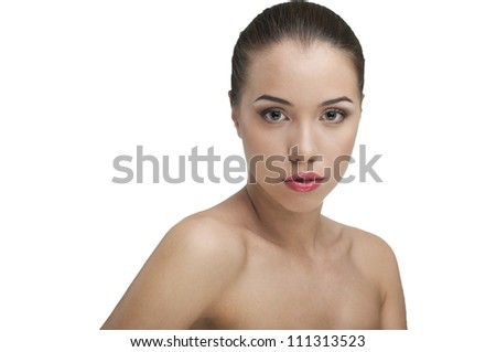 Glamour portrait of beautiful woman model with fresh daily makeup. Fashion shiny highlighter on skin, sexy gloss lips make-up and dark eyebrows