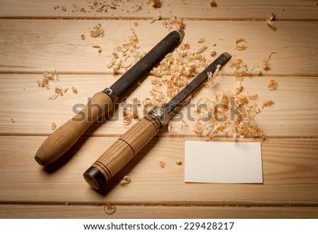 joinery tools on wood table background with business card and copy space