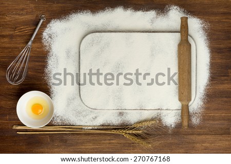 Dough recipe ingredients like eggs, flour, oil, sugar on white wooden table