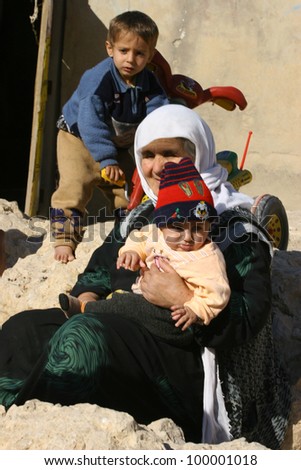 MAHMUR, IRAQ-JAN 26: Unidentified family in Mahmur Refugee Camp, Iraq, January 26,2007. Mahmur Camp is a home to 12,000 refugees who fled from Turkey in the 90s - those due to clashes between PKK and Turkish army