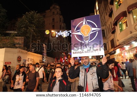 ISTANBUL,TURKEY-OCTOBER 4: Demonstrators protest against the war with Syria  inTaksim Square on October 4, 2012 in Istanbul, Turkey
