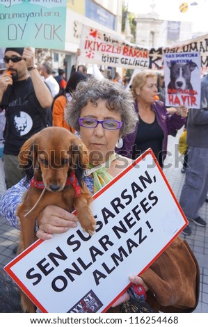 ISTANBUL-OCTOBER 21:Thousands of animal rights activists marched against a draft law on Sunday that would make changes to Turkey\'s Animal Protection Law No. 5199 on October 21,2012 in Istanbul,Turkey.