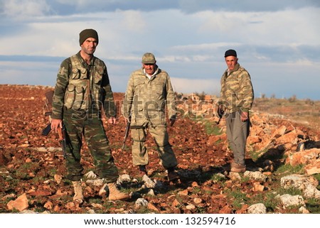 MARDIN,TURKEY- MARCH 17 :Unidentified Kurdish paramilitary stands guard on March 17, 2013 in Mardin, Turkey. They are called ranger in Turkey.