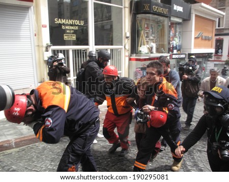 ISTANBUL, TURKEY-MAY 1: Turkish police fired water cannon and tear gas to prevent protesters from defying a ban on May Day rallies and reaching Taksim Square on May 1, 2014 in Istanbul, Turkey.