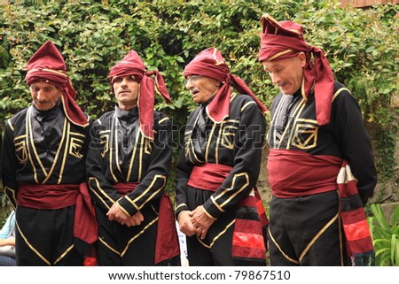 ARTVIN,TURKEY-MAY 28:Georgian folk dancing group in their traditional costumes sing local songs on May 28, 2011 in Macahel which is a historical geographical area between Turkey and Georgia.