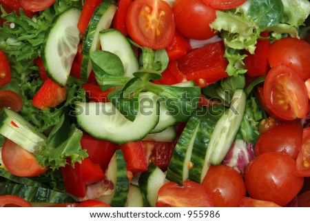 fresh salad with cherry tomato, cucumber, salad, red peppers and more.