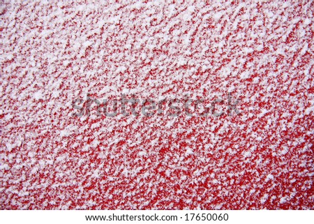 pure white new snow in red metal, fantastic texture and detail. Perfect for backgrounds in your designs.