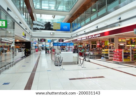 DUBAI, UAE - JUNE 20: Duty free shops in Dubai International Airport on June 20, 2014 in Dubai, UAE.