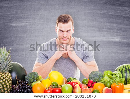 Young man looking for jobs - the words events, social media, internet, agency and newspaper written on a chalkboard background