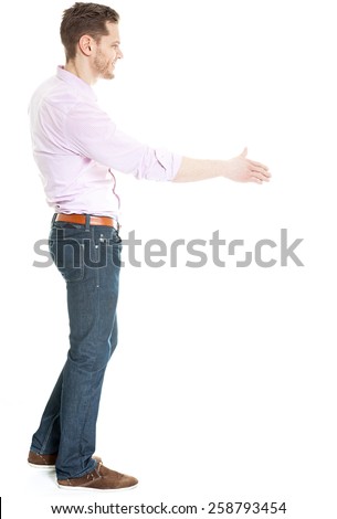 Side view of man offering hand for hand shake - isolated on white