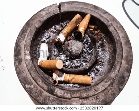 Similar – Image, Stock Photo Many cigarettes lie on the street and pollute the environment