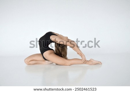 Similar – Image, Stock Photo Ballerina while she is dancing the Swan Lake.