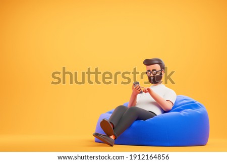 Handsome cartoon beard character man in white t-shirt relax at blue bean bag armchair  and use smartphone over yellow background. 3d render illustration.