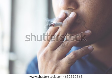 Similar – Image, Stock Photo Young man smoking cigarette in the night