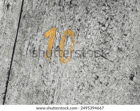 Similar – Image, Stock Photo Number 10 next to the yellow parking space markings