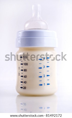 Baby bottle on white  milk formula
