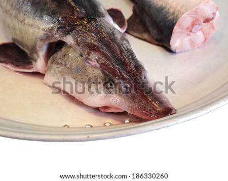 Caspian sea sturgeon fish on a tray