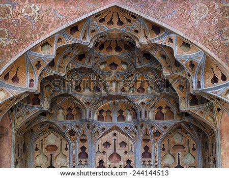 ISFAHAN, IRAN - OCTOBER 23: Plaster-work of music hall of Ali Qapu palace on October 23, 2014 in Isfahan. Ali Qapu was built by decree of Shah Abbas I in the early seventeenth century.