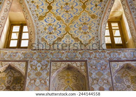 ISFAHAN, IRAN - OCTOBER 23: Ali Qapu palace on October 23, 2014 in Isfahan. Ali Qapu is a grand palace in Isfahan that was built by decree of Shah Abbas I in the early seventeenth century.