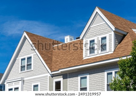 Similar – Image, Stock Photo Facade on a sloping, narrow street. The house is old, the shutters closed.