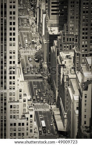 Street of New York City from above with cars and pedestrians