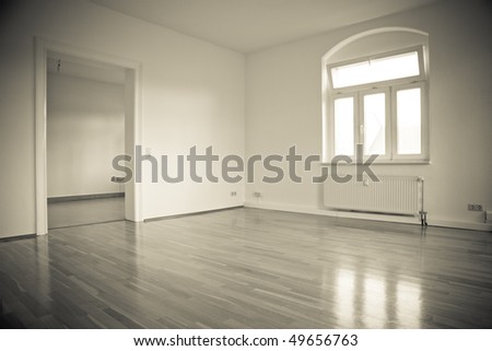 empty loft like living room with window, vintage monochrome